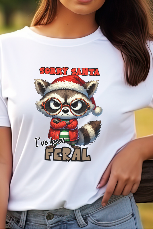 Funny Christmas Raccoon Shirt – 'Sorry Santa, I've Been Feral' Holiday Graphic Tee